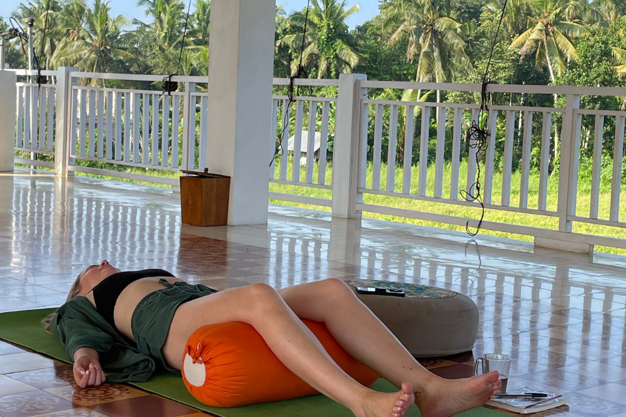 woman doing yoga at retreat in Bali